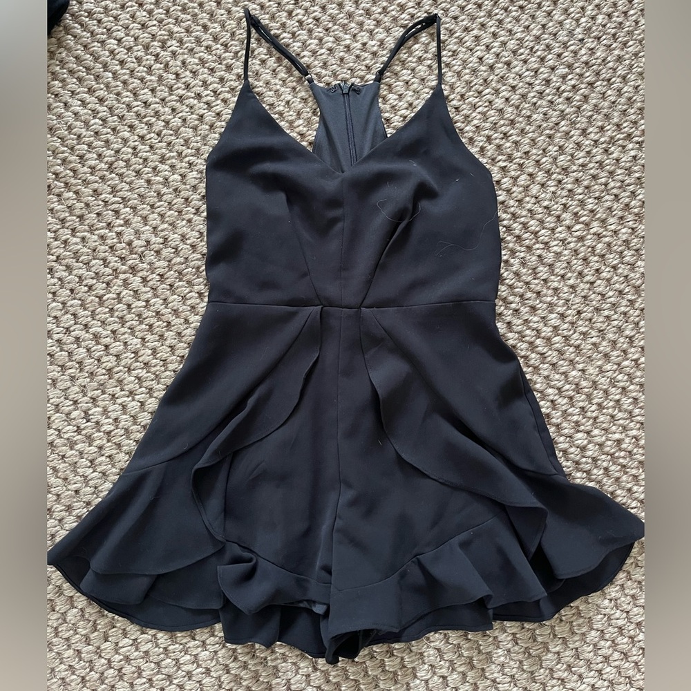 Impeccable Pig black romper with ruffles and adjustable straps